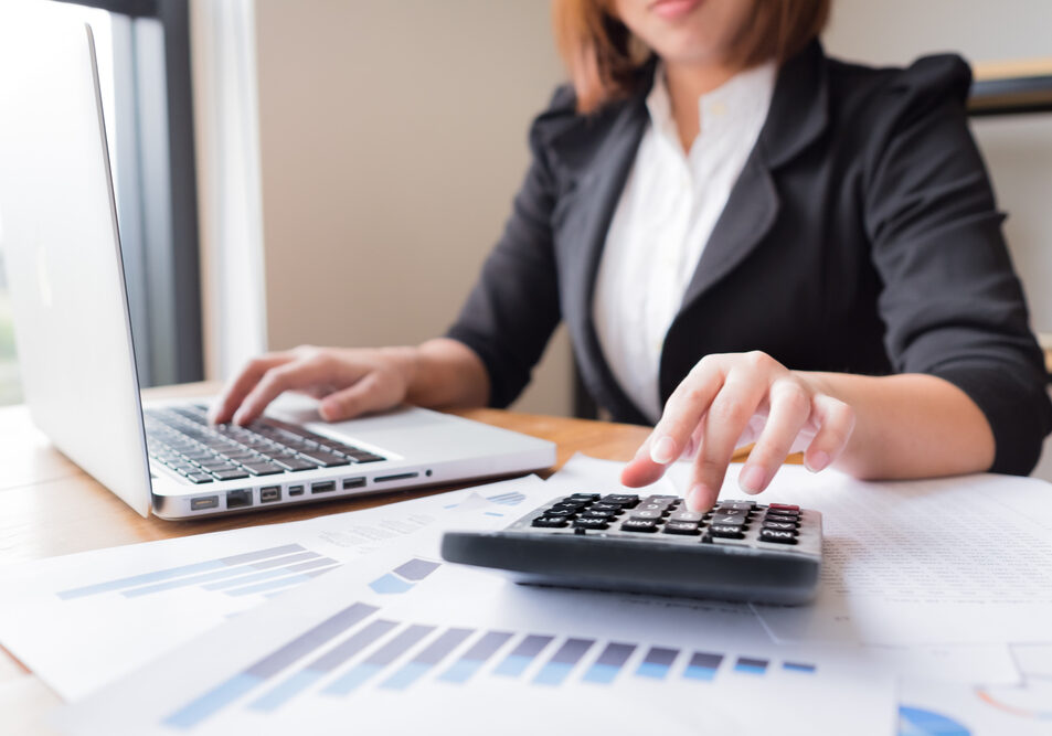 Asian,Female,Accountant,Or,Banker,Making,Calculations.,Savings,,Finances,And