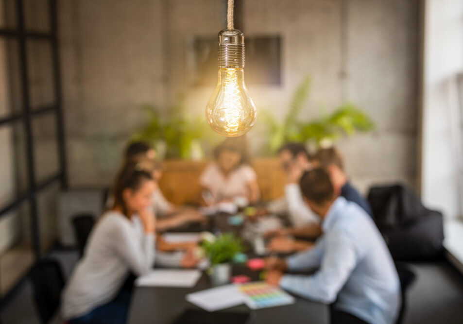 Young,Business,People,Are,Discussing,Together,A,New,Startup,Project. Young,Business,People,Are,Discussing,Together,A,New,Startup,Project.