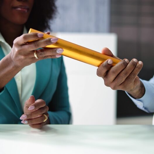 Business,Man,And,Woman,Relay,Baton,Handover,And,Pass